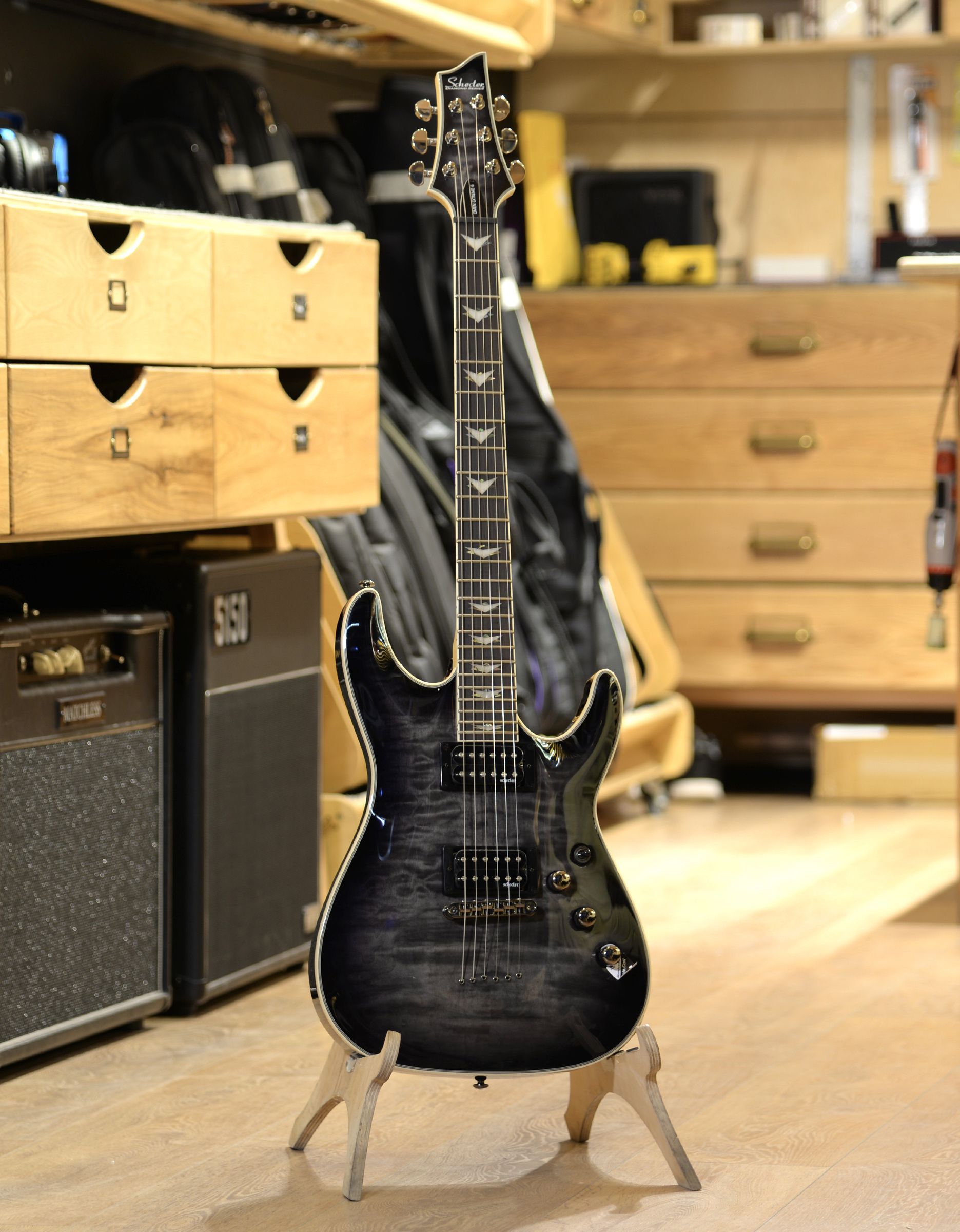 Электрогитара Schecter Omen Extreme-6 See-Thru Black - купить в "Гитарном Клубе"