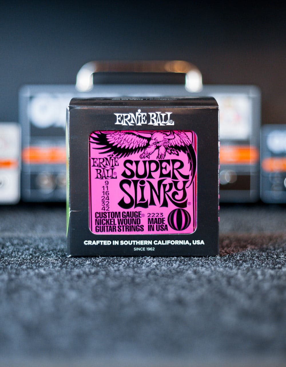 Струны для электрогитары Ernie Ball 2223 Super Slinky, 9-42 - купить в "Гитарном Клубе"
