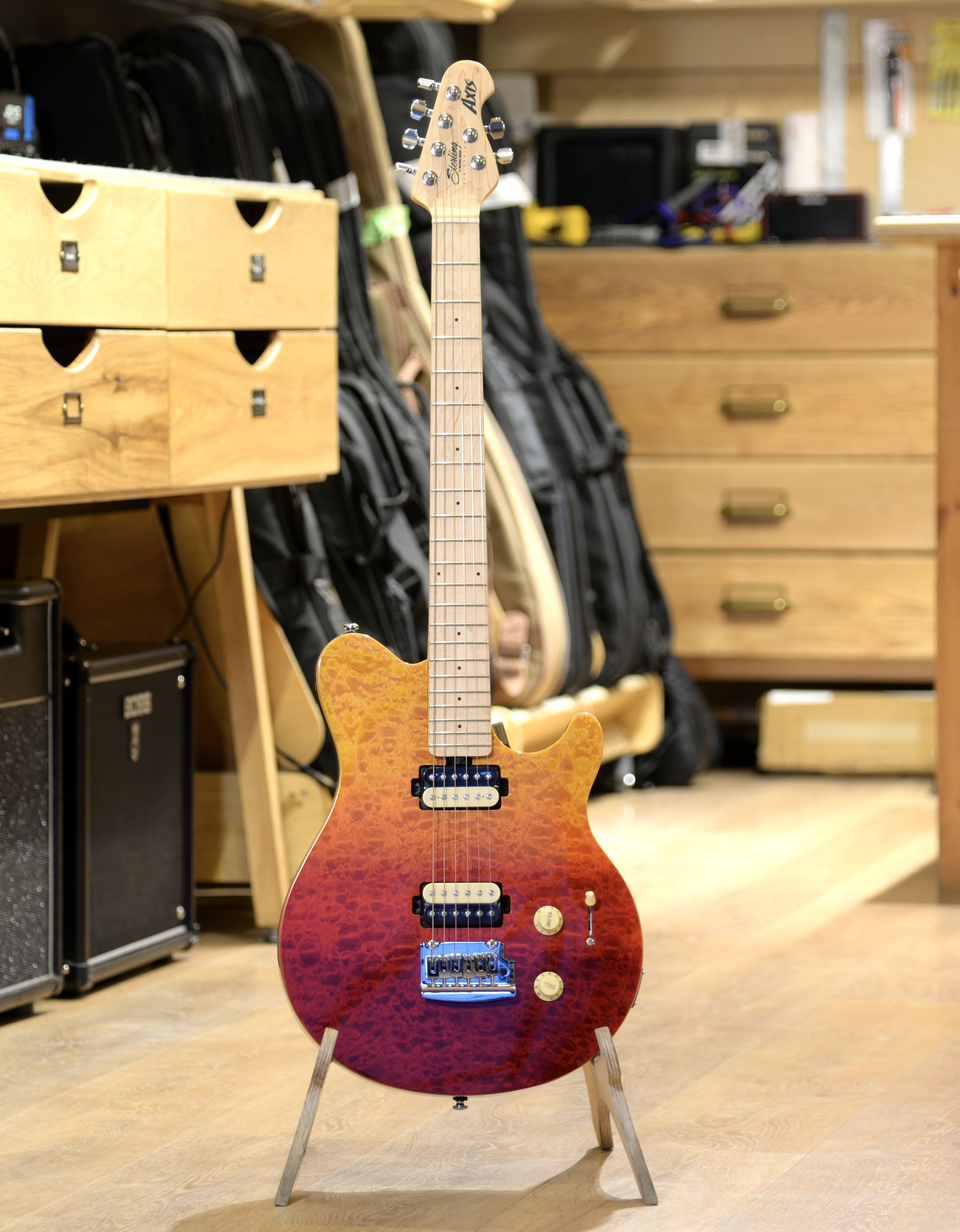 Электрогитара Sterling Axis Spectrum Red - купить в "Гитарном Клубе"