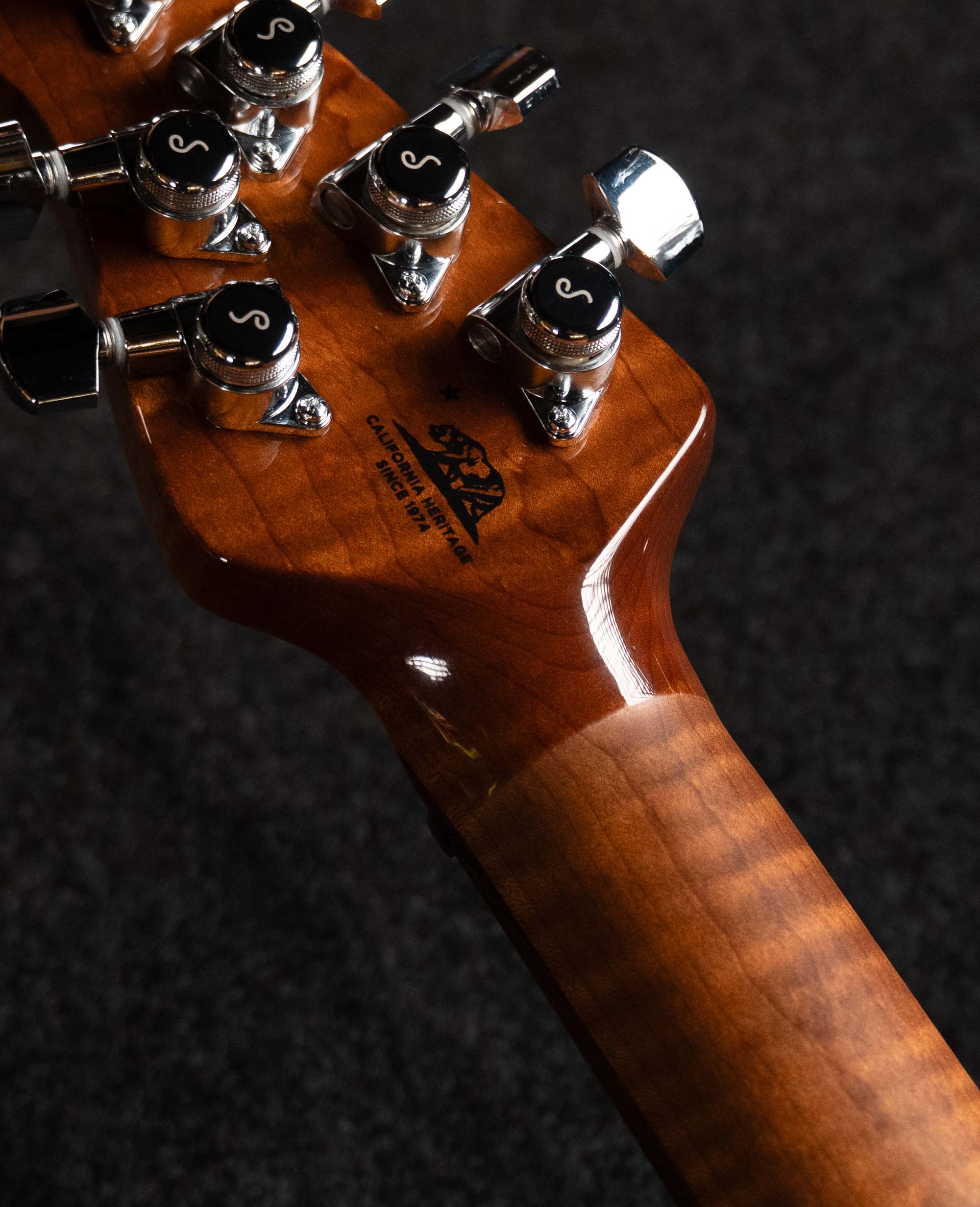 Электрогитара Music Man Stingray Oxblood Baritone - купить в "Гитарном Клубе"