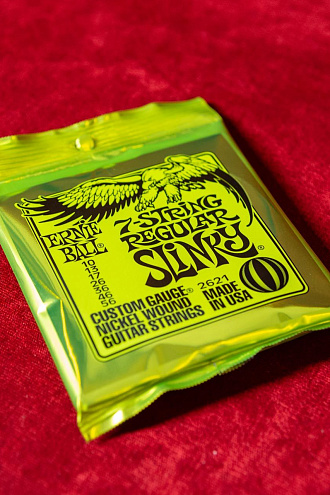 Струны для 7-струнной электрогитары Ernie Ball 2621 Regular Slinky, 10-56 - купить в "Гитарном Клубе"
